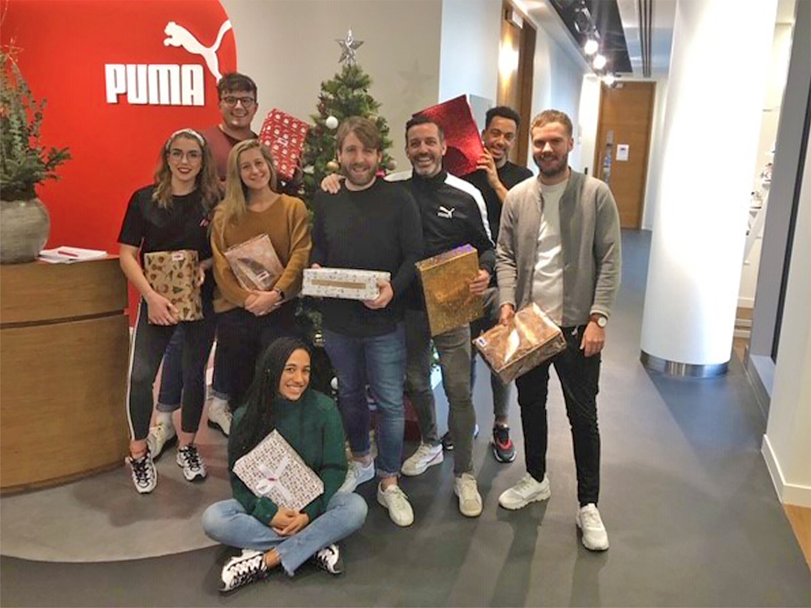 PUMA employees smiling