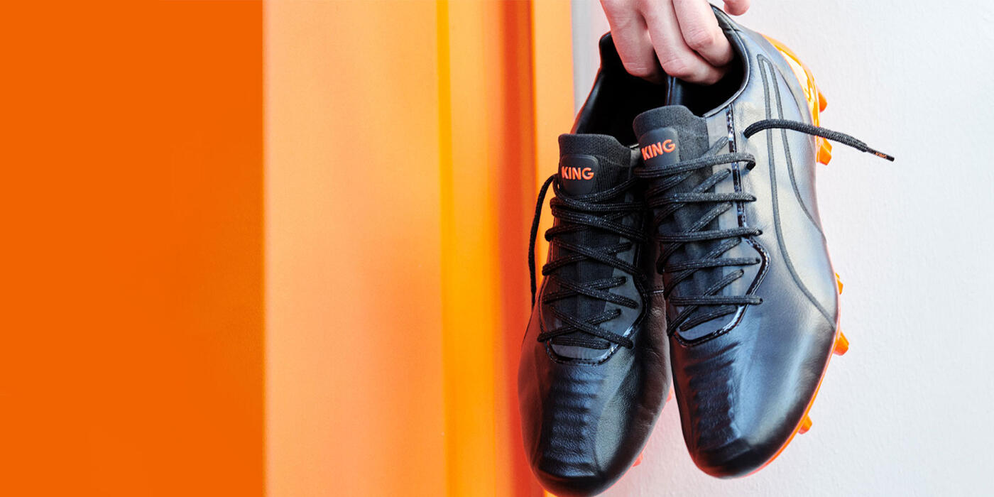 Puma king homme sales orange