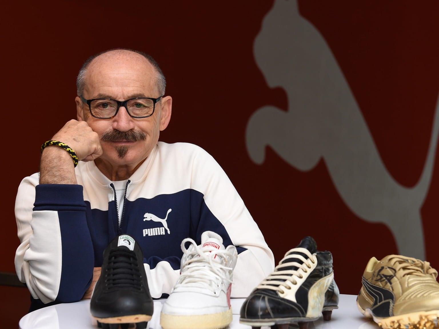 Helmut Fischer with four PUMA shoes