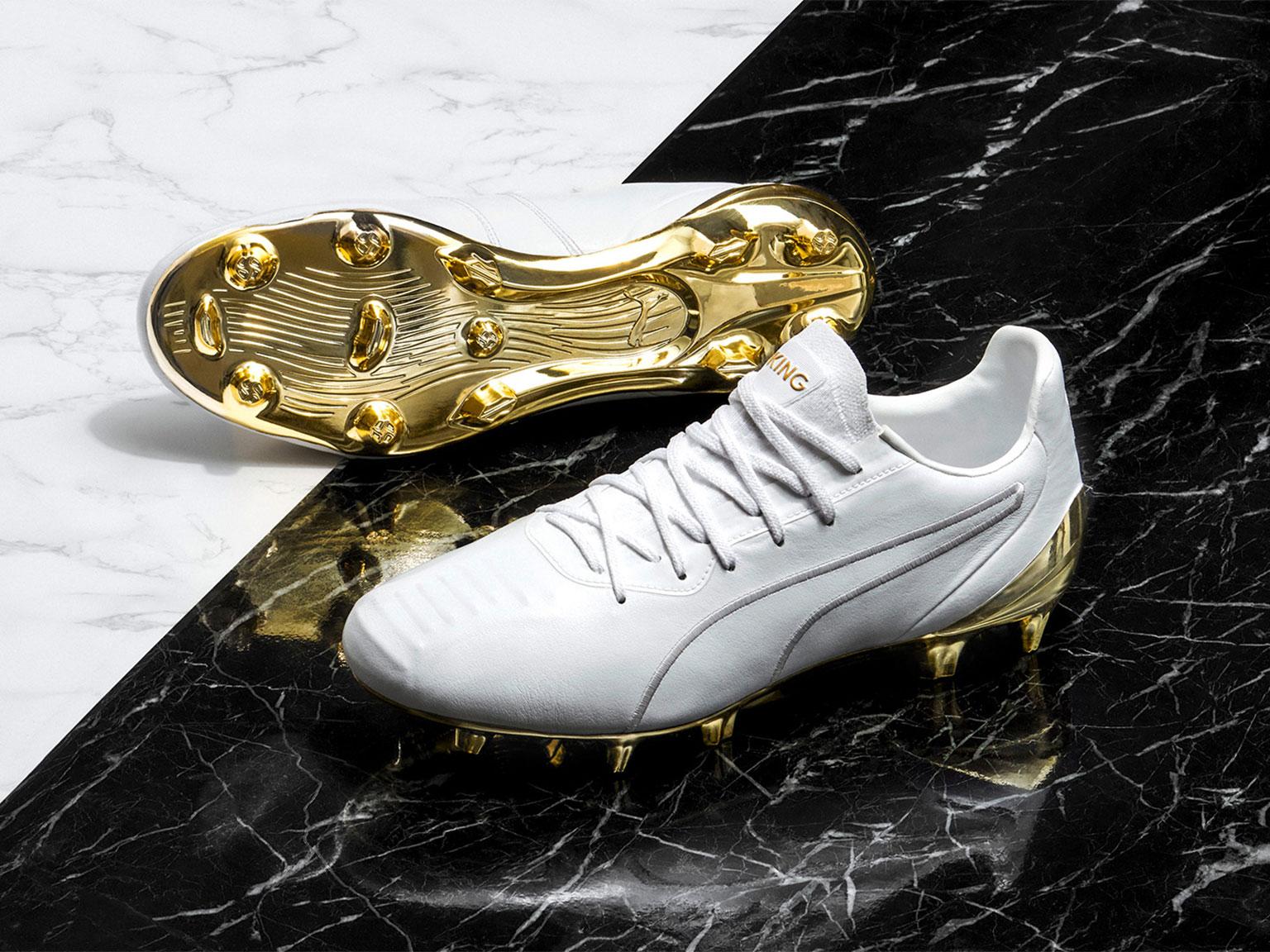 Puma king clearance black and gold