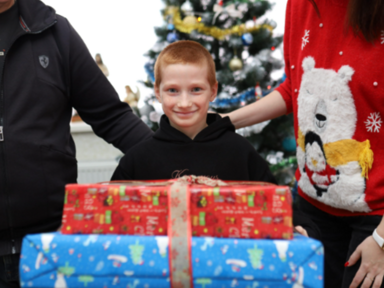 Kid with presents