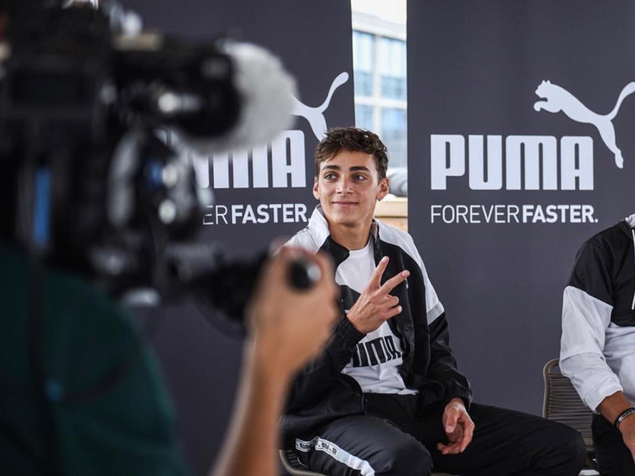 PUMA employee sitting in front of cameras