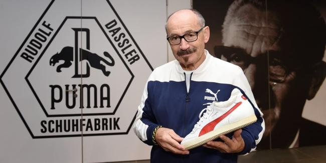 Helmut Fischer is showing a PUMA shoe